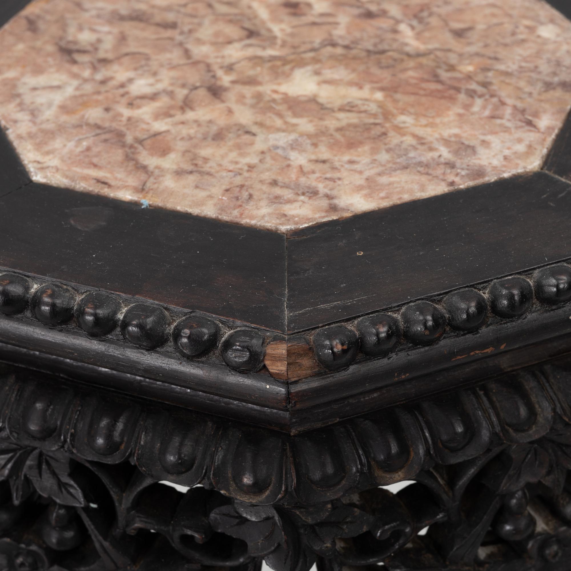 A Chinese small table, carved wood and stone, 1900s.