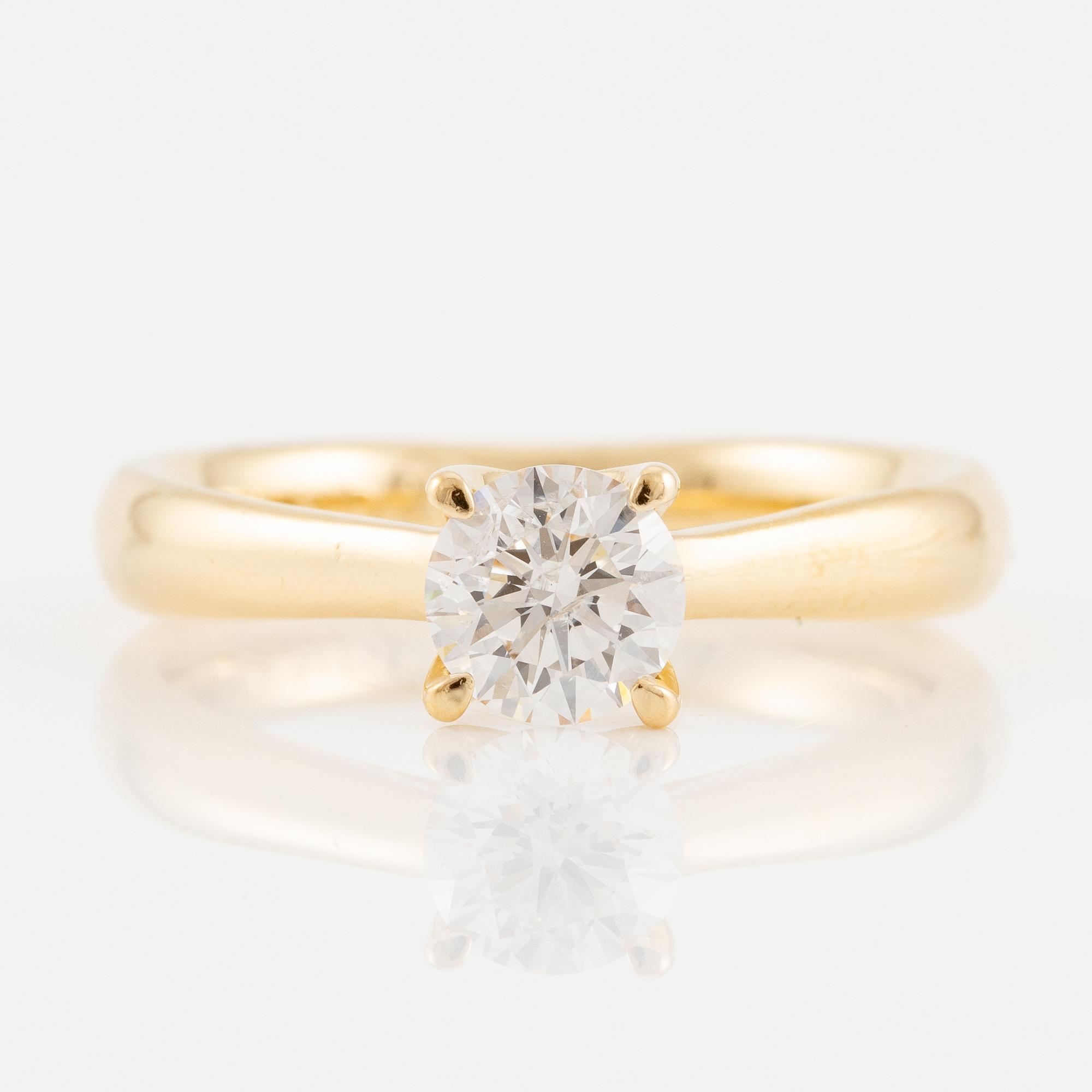 Ring 18K guld med briljantslipad diamant ca 0.97 ct.