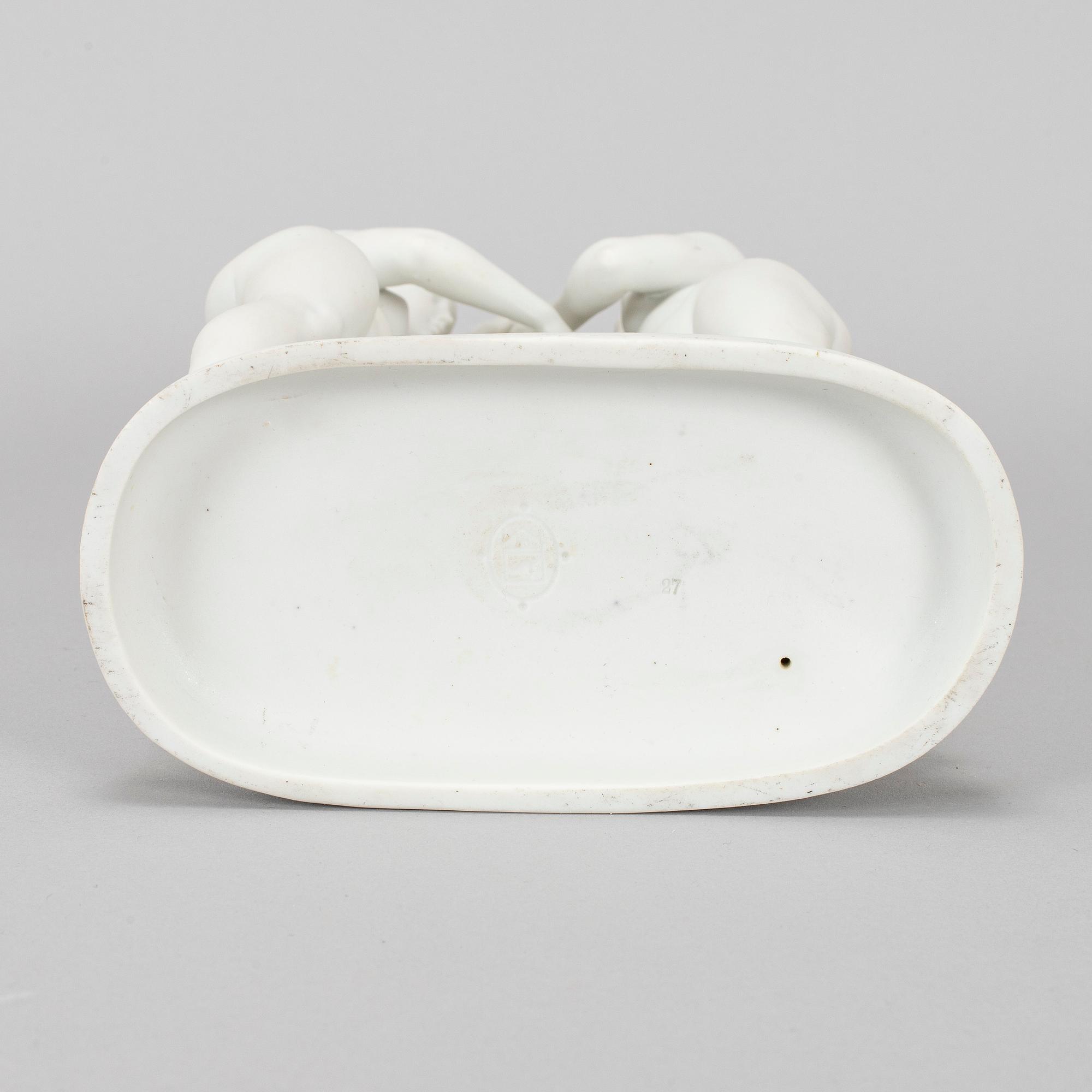 A porcelain figurine, Three Graces.