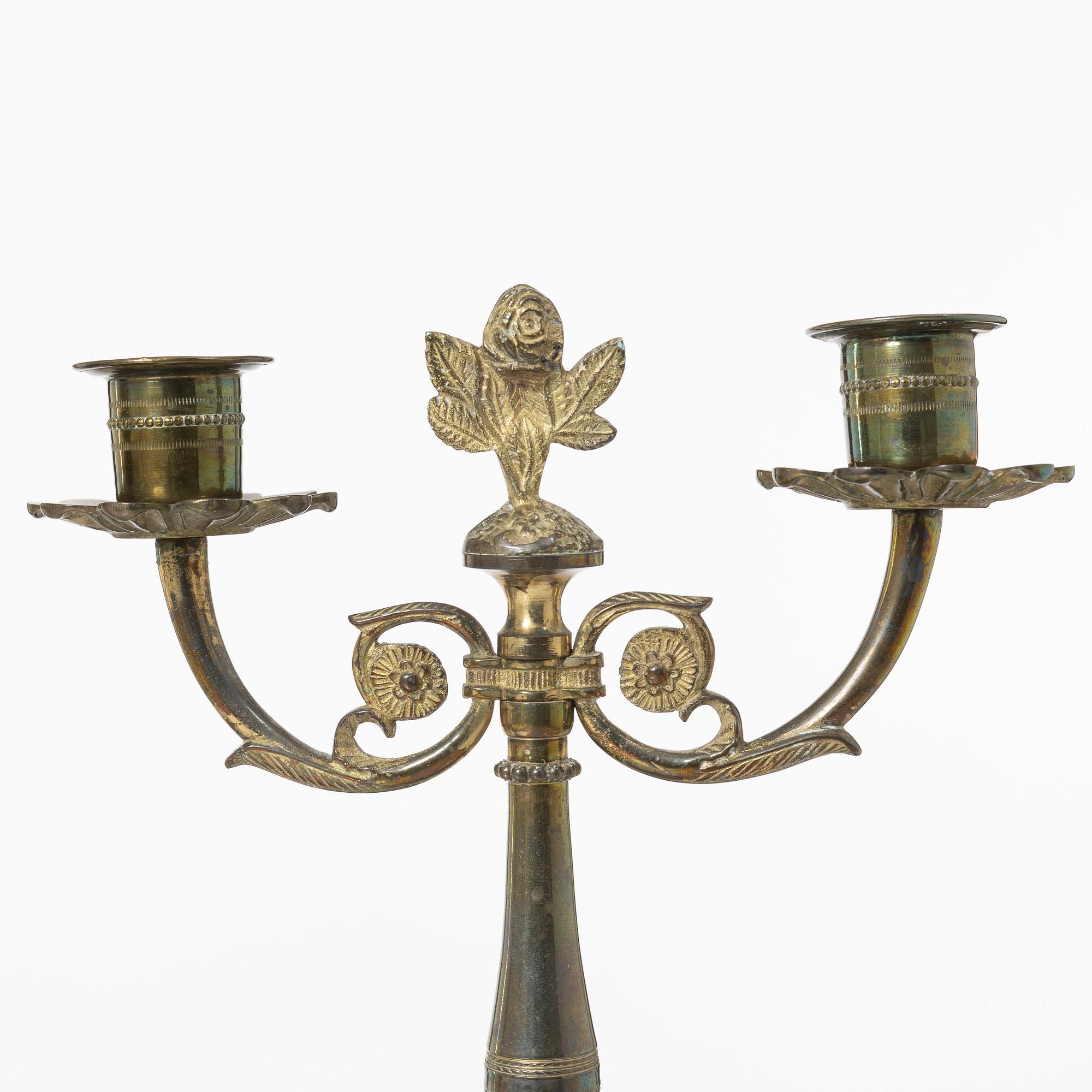 Candle holders, a pair of brass, Empire style, 20th century.
