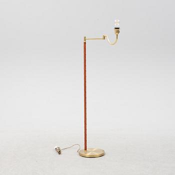 A brass floor lamp from EWÅ, second part of the 20th Century.