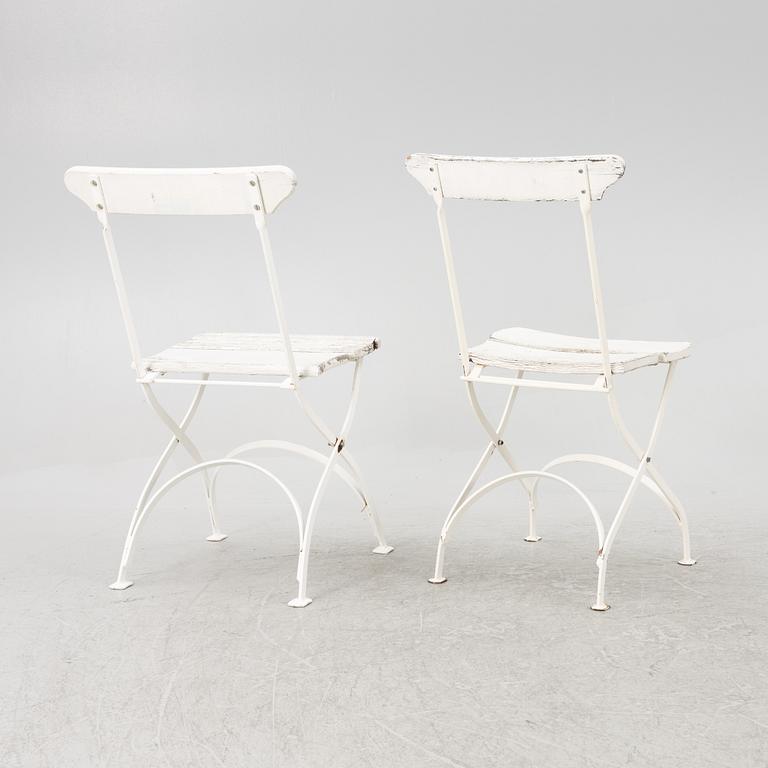 A set of seven garden chairs and two tables Byarums bruk, later part of the 20th century.