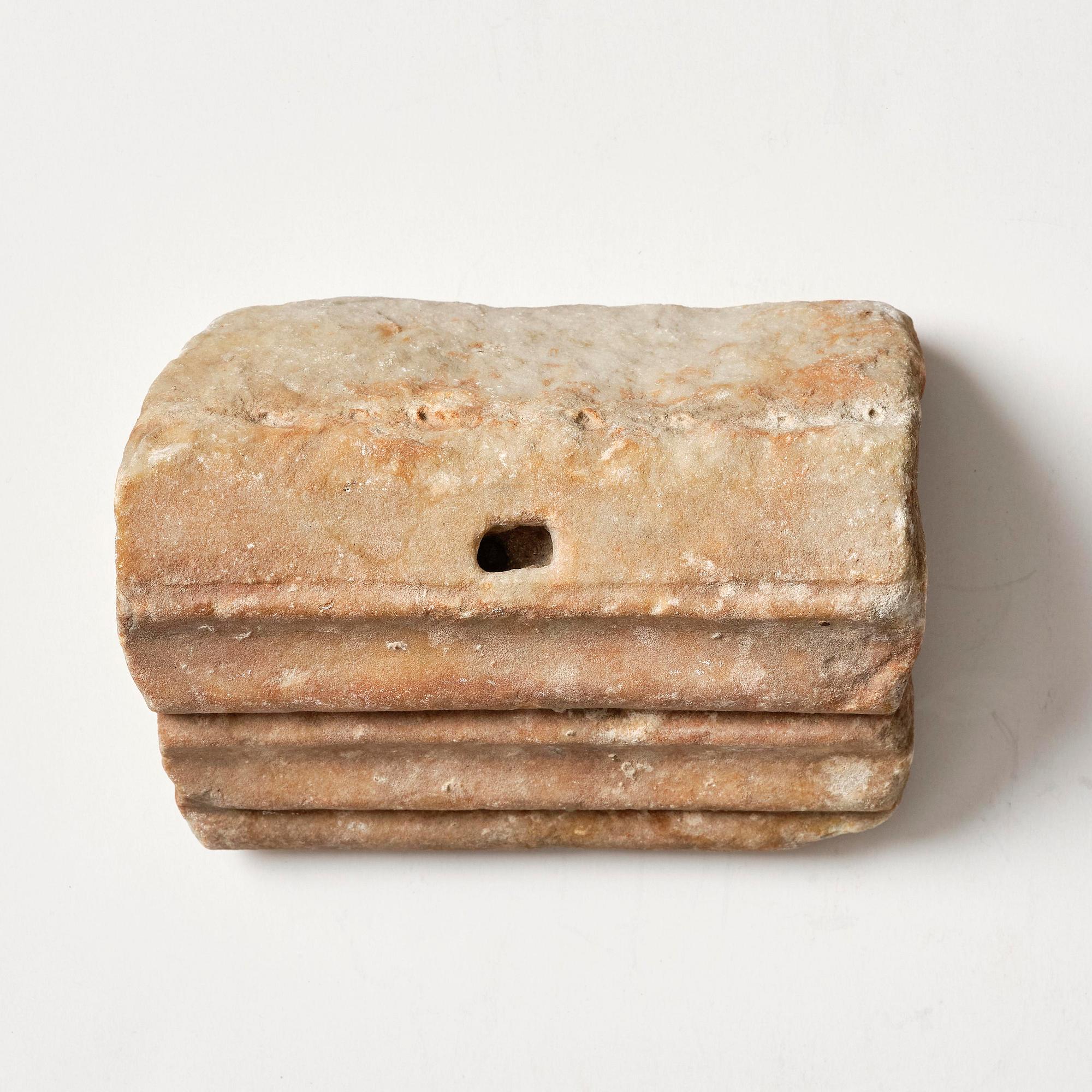 A presumably Hellenistic marble part of a frieze.