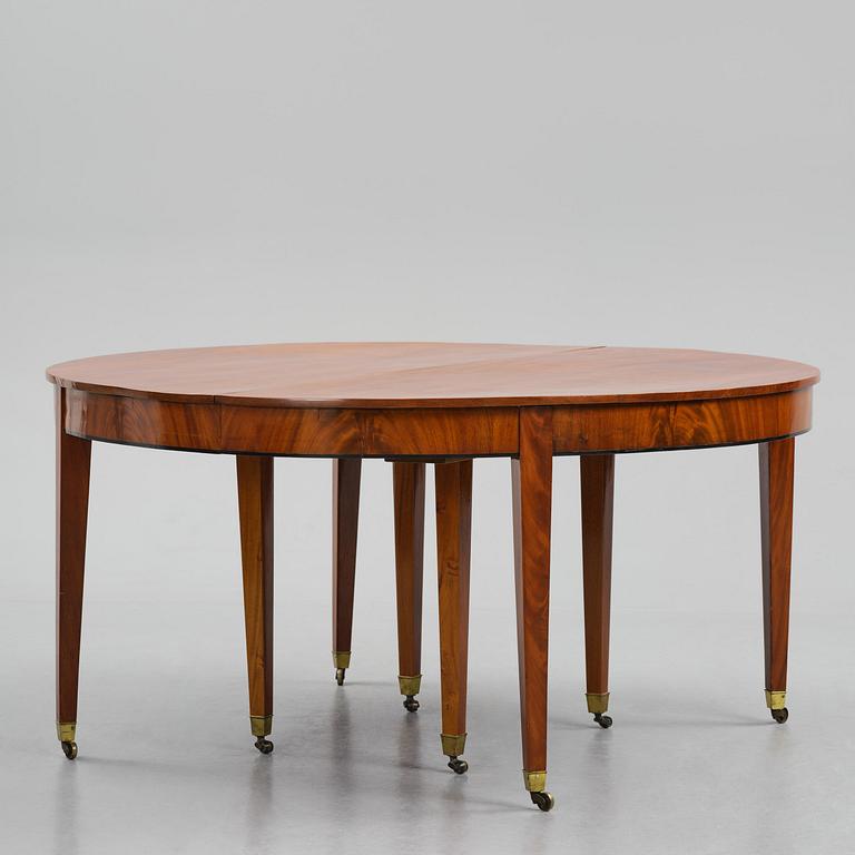 A George III mahogany D-end dining table, circa 1800.