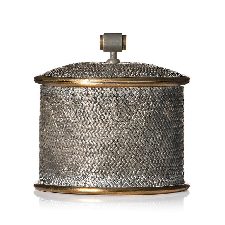 Björn Trägårdh, a pewter and brass lidded jar, model "A 2273", Firma Svenskt Tenn, Stockholm, 1944.