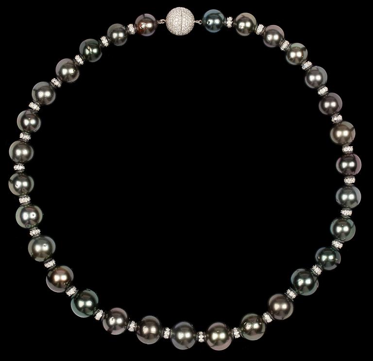 A cultured Tahiti pearl, 14-12 mm, and diamond necklace, tot. app. 5.50 cts.