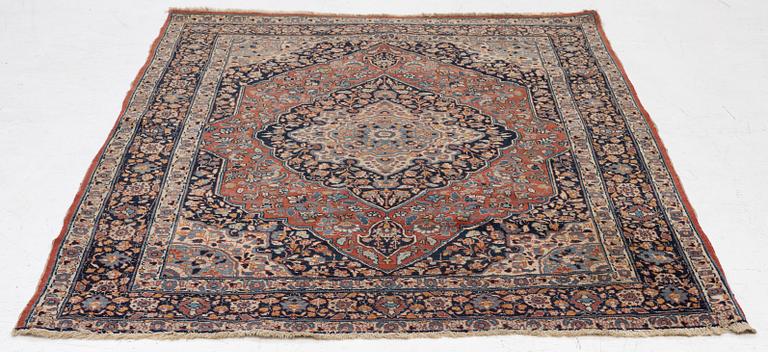 An oriental rug, c. 180 x 140 cm.