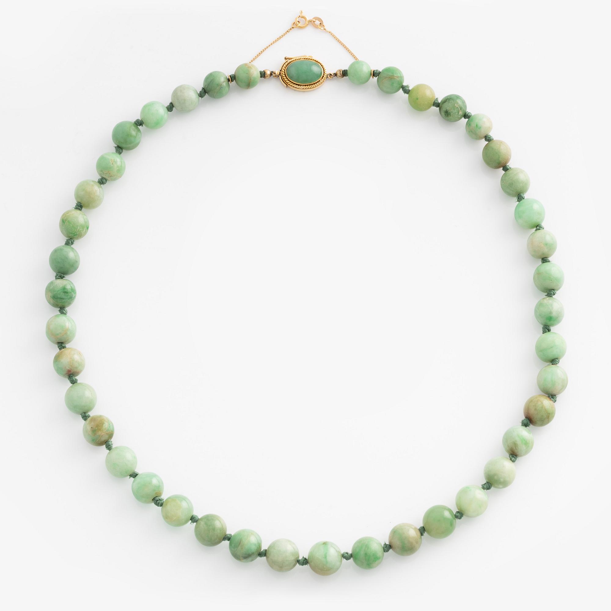 Necklace and a pair of earrings.