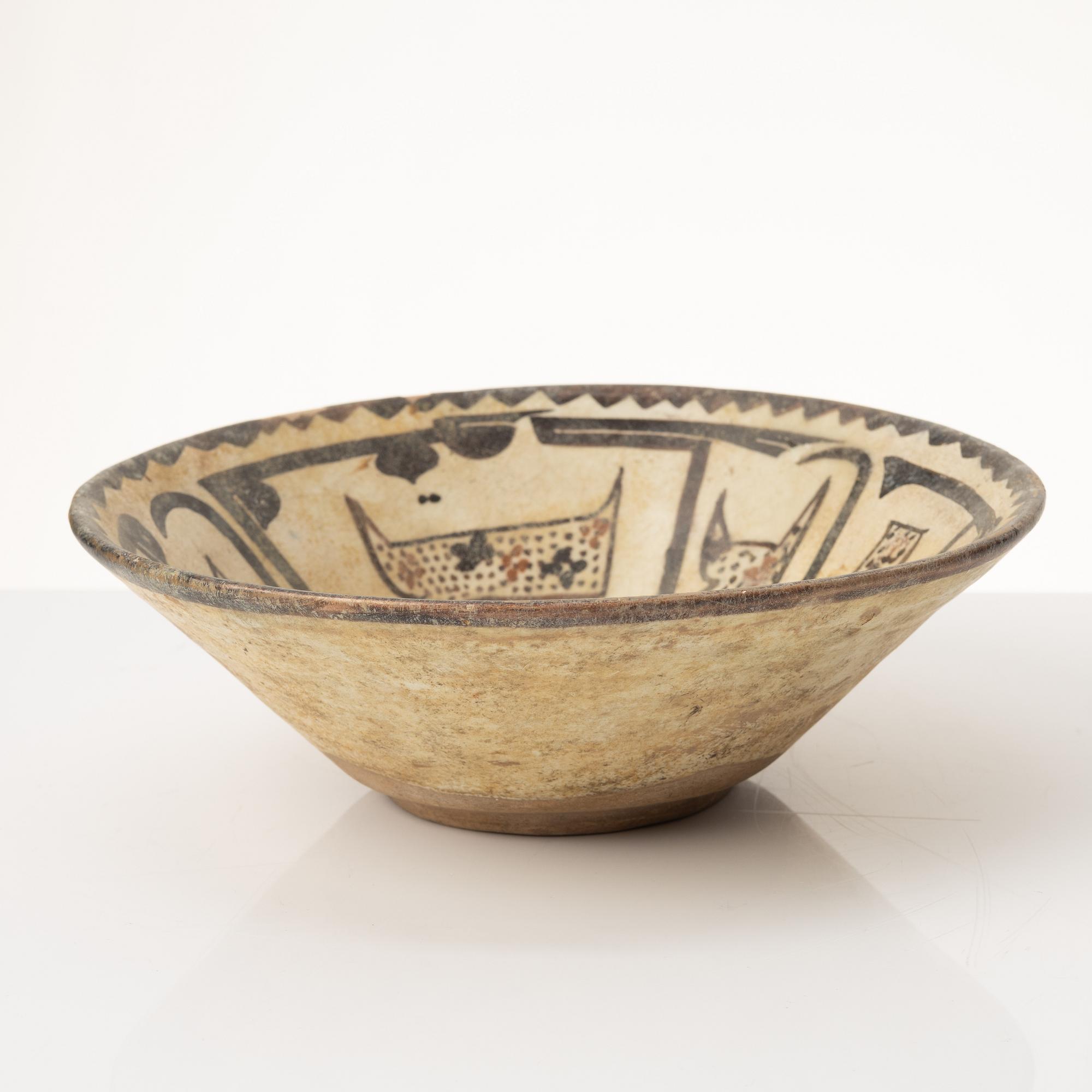 A glazed earthenware bowl, Central Asia.