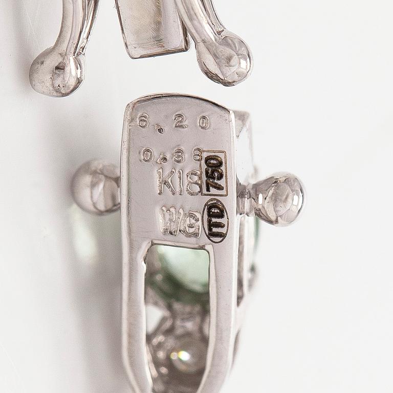 Rannekoru, 18K valkokultaa monivärisillä safiireilla ja timanteilla.