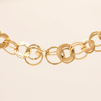 An 18K gold bracelet from Cusi Italy.