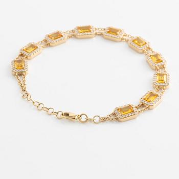 Bracelet with yellow sapphires and brilliant-cut diamonds.