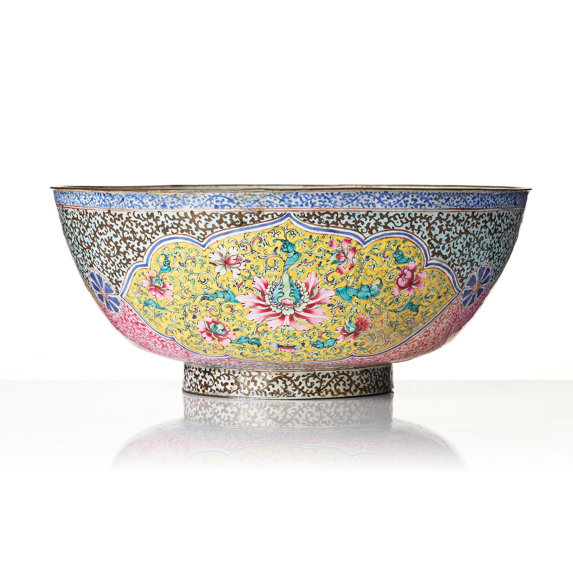 A large enamel on copper bowl, and a cover, Qing dynasty, 18th century.