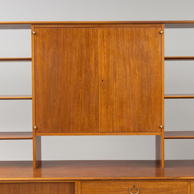 Josef Frank, a mahogny sideboard with cabinets, shelves, writing flap and drawers, Svenskt Tenn, a special commission, 1940-50s.