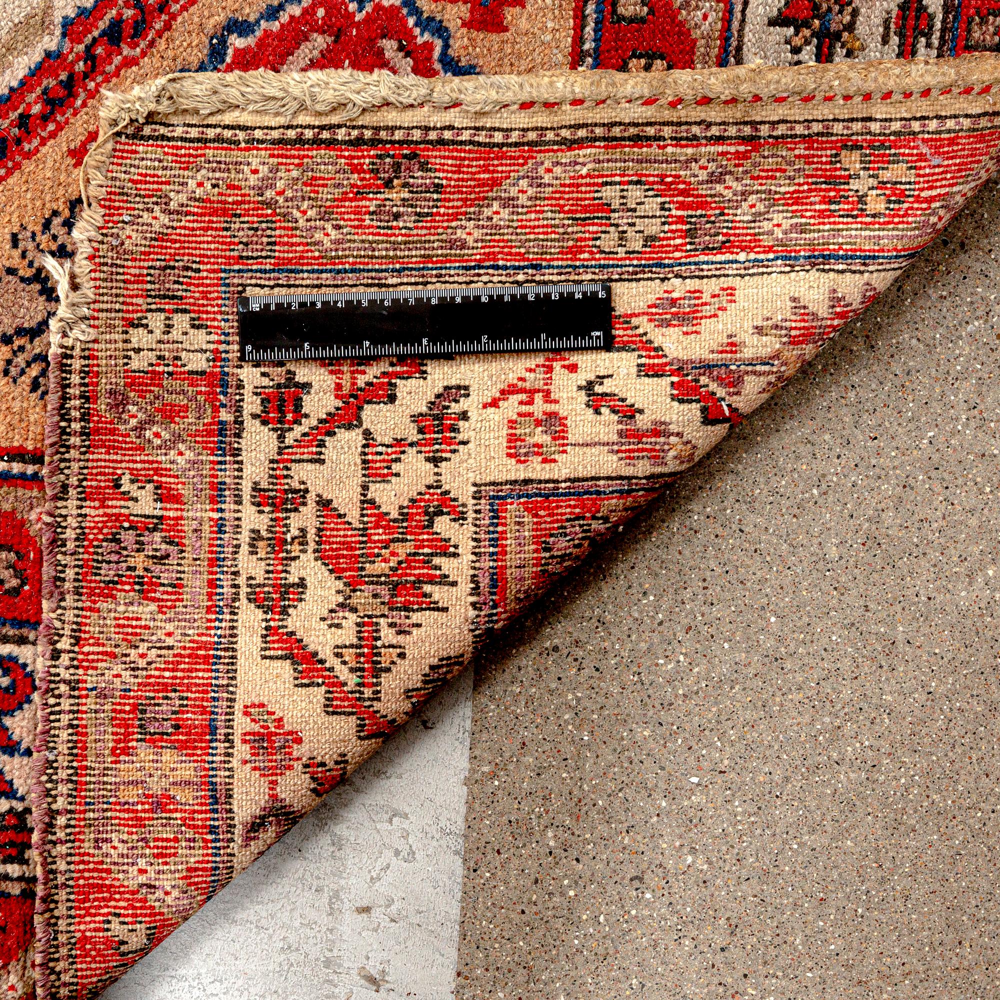 An antique Malajir runner ca 505x102 cm.