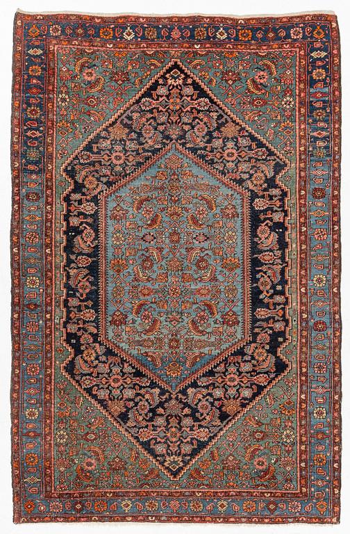 A carpet, semi-antique Hamadan, c. 199 x 128 cm.
