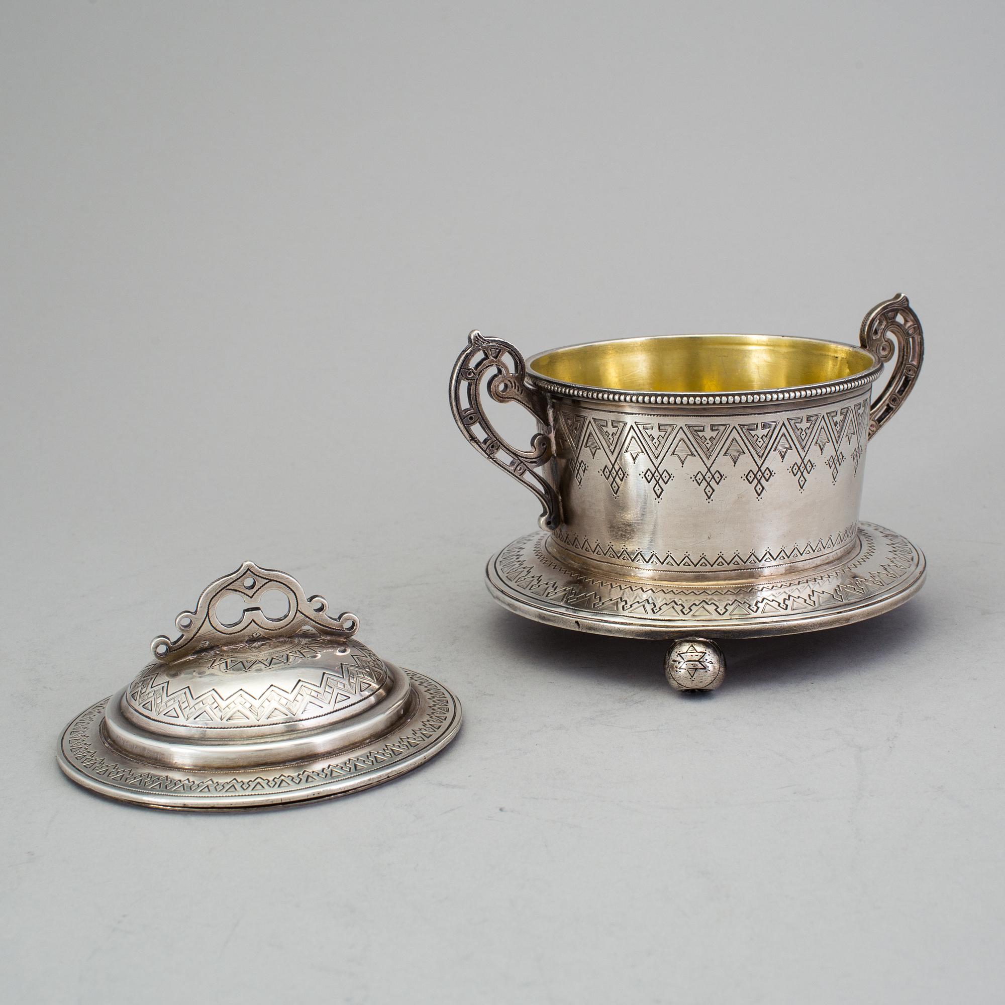 A Russian 19th century parcel-gilt sugar-casket, unidentified makers mark, St. Petersburg 1877.