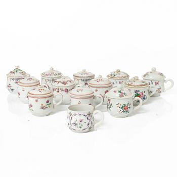 A group of 12 CHinese famille rose porcelain custard cups with covers, Qing dynasty, 18th century.