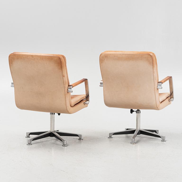 Kenneth Bergenblad, a pair of leather upholstered 'Herkules' armchairs from Dux.
