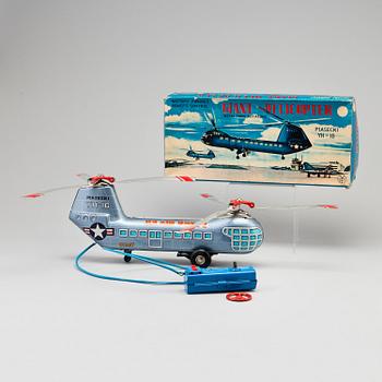 A toy metal car "Sunday Driver", Kosuge, Japan, and "Giant Helicopter", YF, Japan. 1960s.