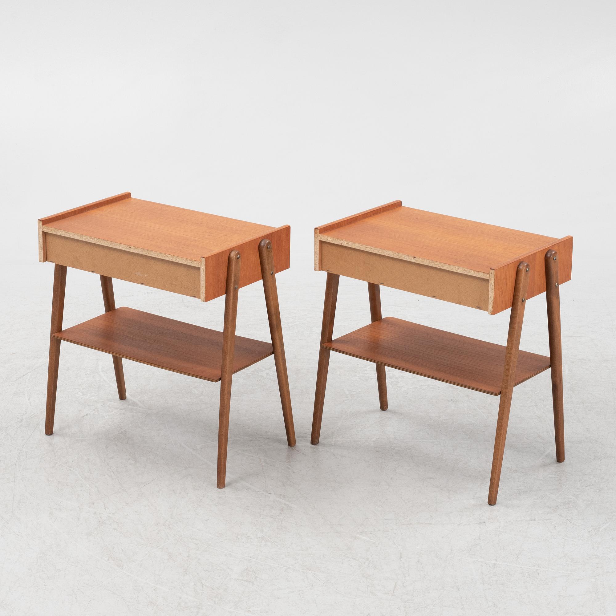 A pair of teak veneered bedside tables, 1950's/60's.