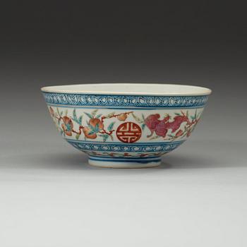 A famille rose and underglaze blue dragon bowl, late Qing dynasty, with Guangxus six character mark and of period.