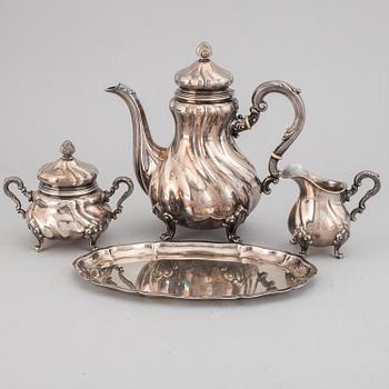 A silver coffee pot, creamer, sugar bowl and tray, swedish import mark.