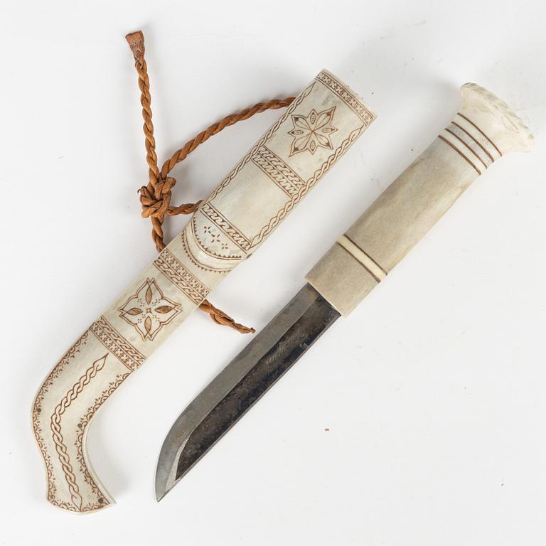 A reindeer horn knife by Johan Mikael Huuva, signed.