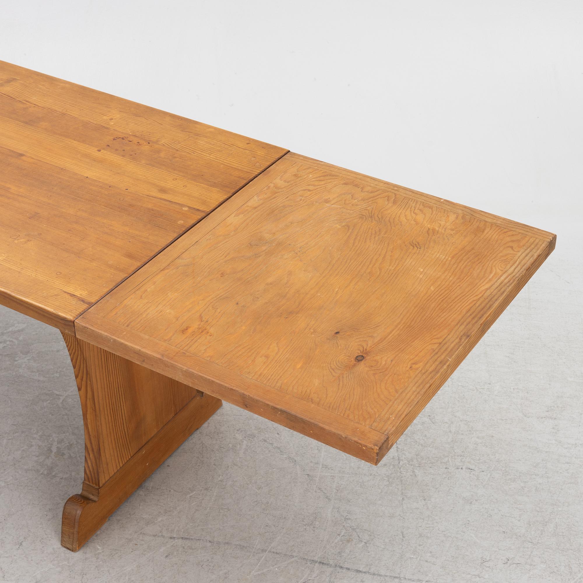 A Nordiska Kompaniet dining table with extension leaves, from the 'Lovö' series.