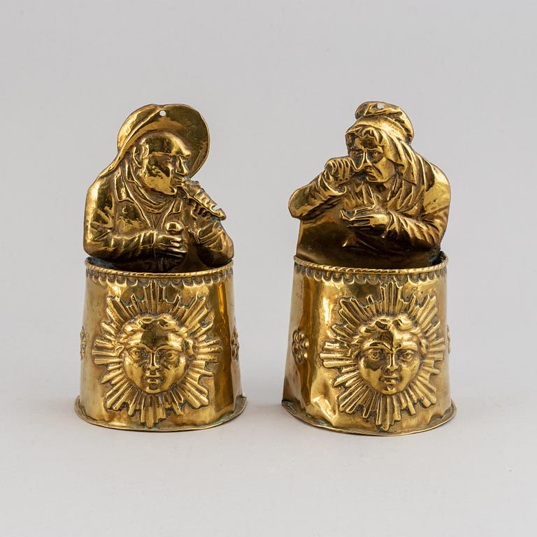 A pair of 19th century brass cutlery holders.