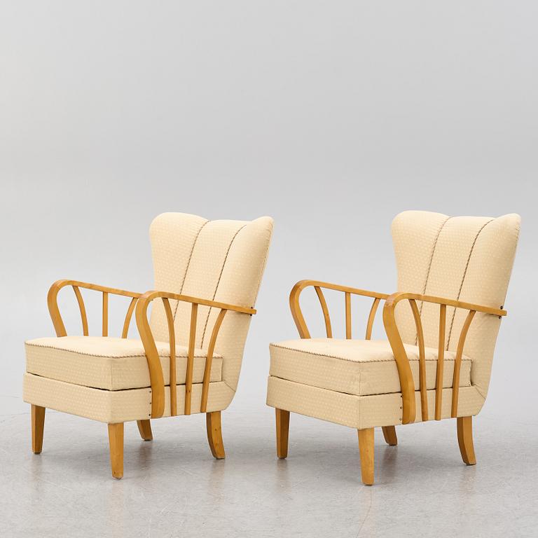 A pair of 1940s Swedish Modern armchairs.
