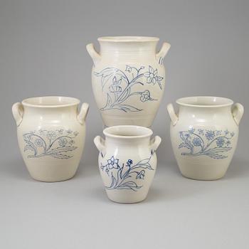 A set of four 20th century blue and white jars by Rörstrand.