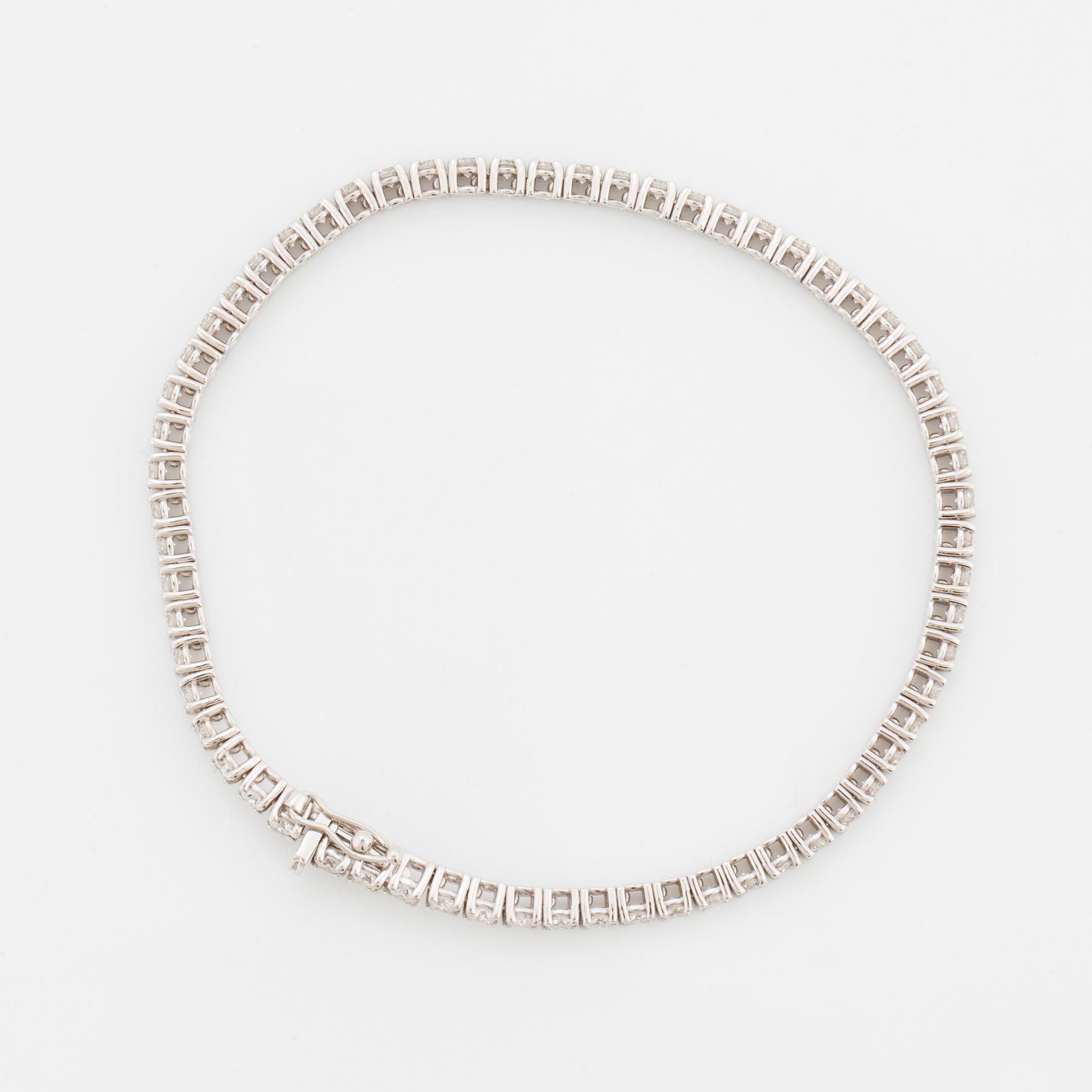 TENNISARMBAND, med briljantslipade diamanter med certifikat HRD.