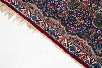 A Kerman carpet, c. 365 x 265 cm.