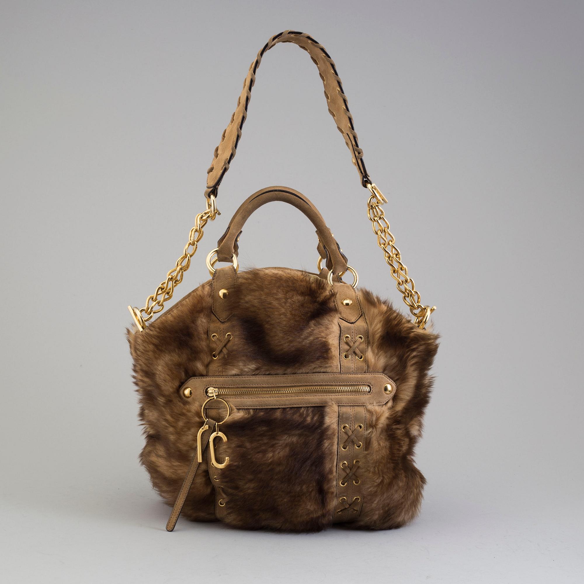 VÄSKA, Roberto Cavalli.