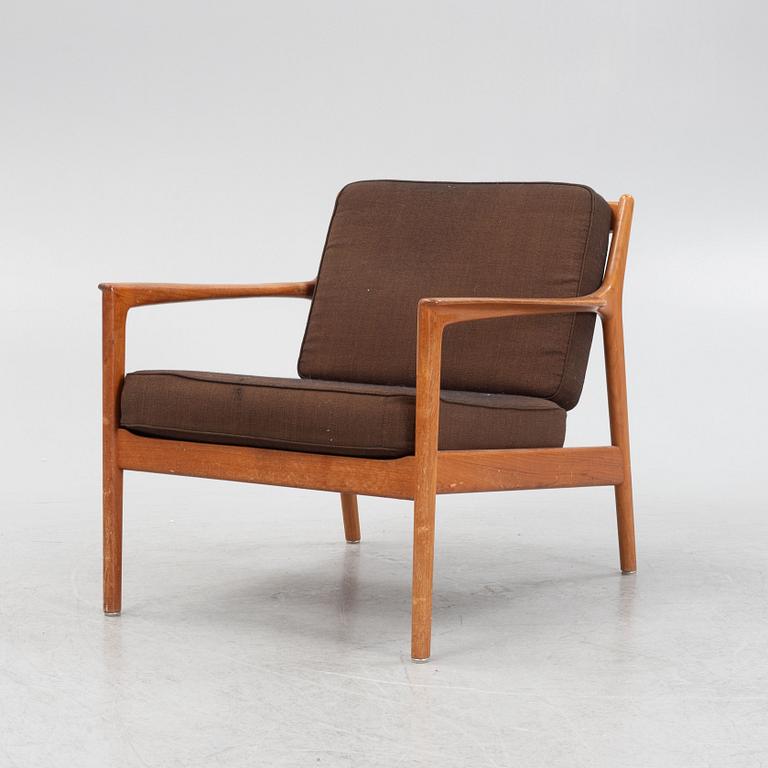 Folke Ohlsson, an 'USA 75' armchair, Dux, Sweden, 1960's.