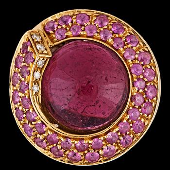 1378. A pink cabochon cut tourmaline, pink sapphire and brilliant cut diamond ring.