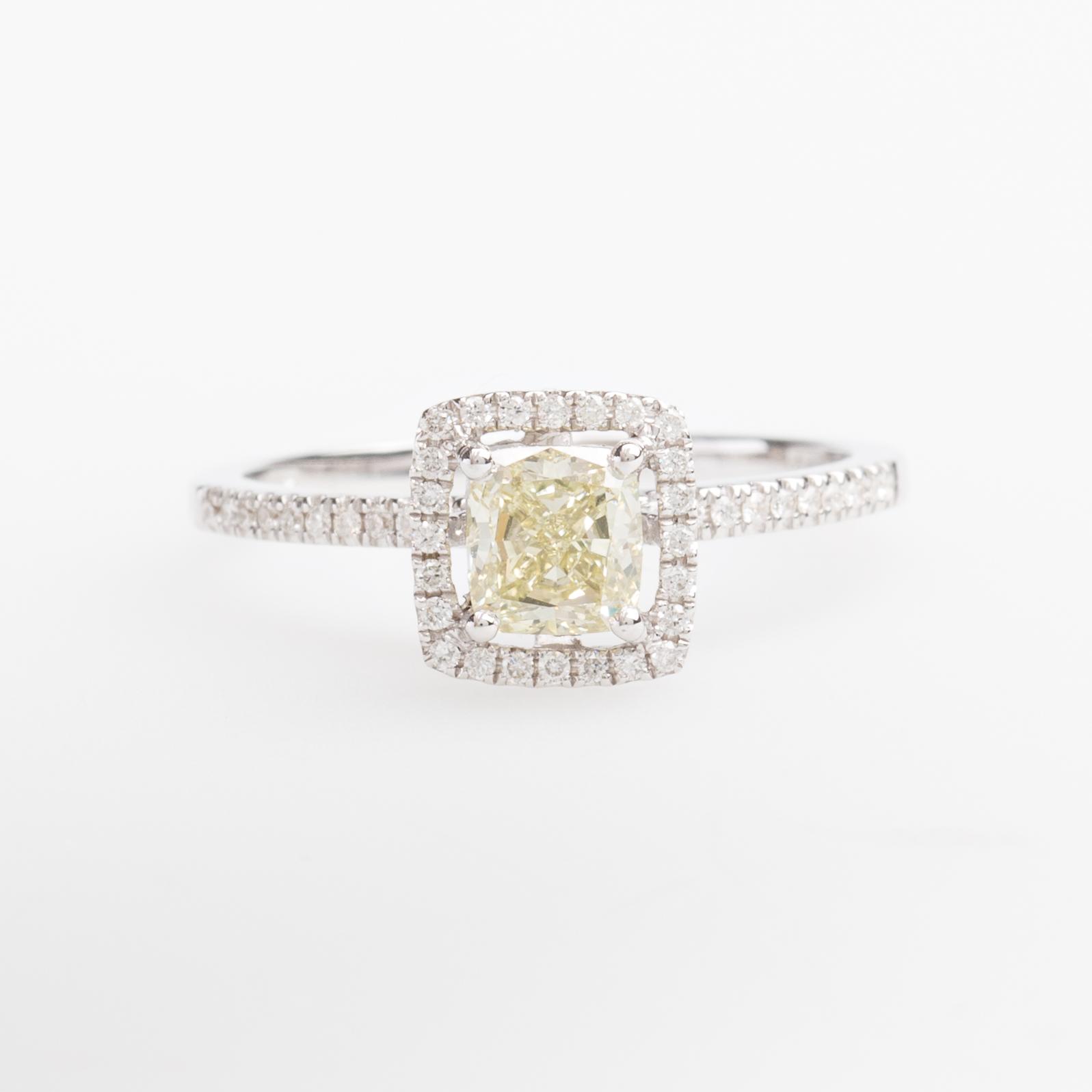RING, 14K vitguld med fasettslipad gul diamant ca 0.70 ct.