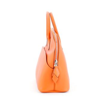 HERMÈS, a orange calf leather handbag, "Bolide".