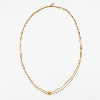 Chain and pendant in 18K gold with pearls.