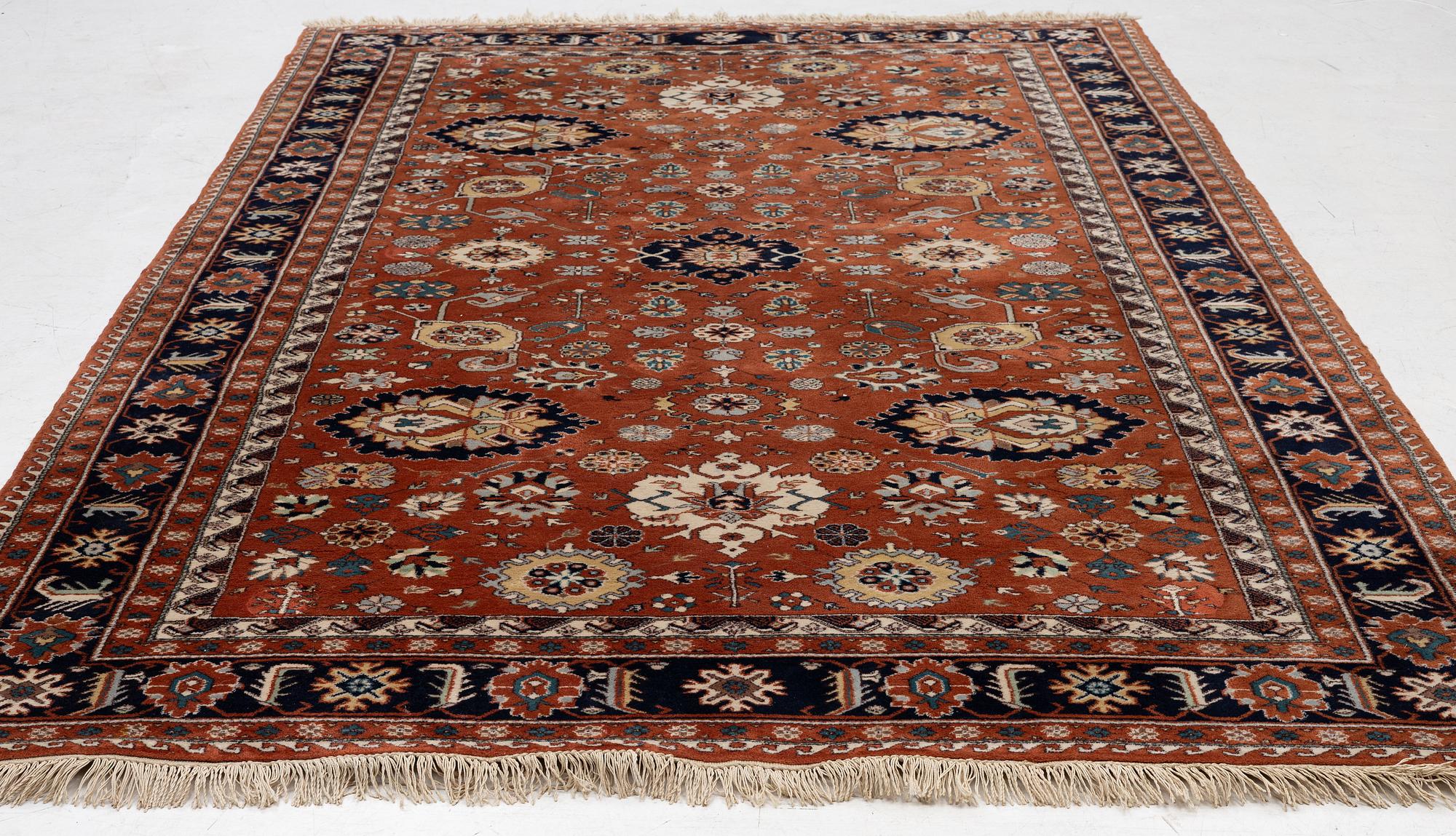 A semi-antique Orientall carpet c. 318 x 202 cm.