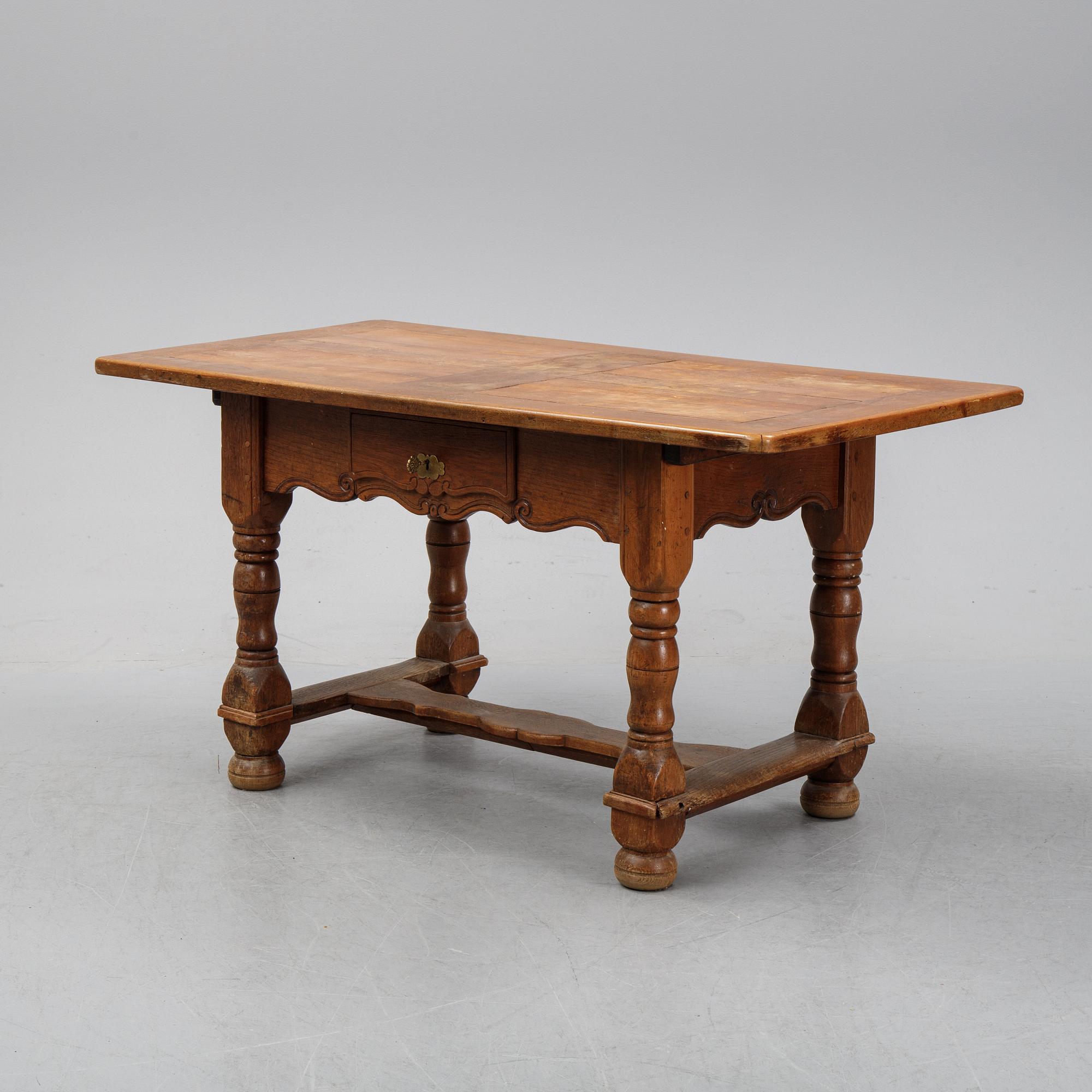 A 19th century baroque style table.