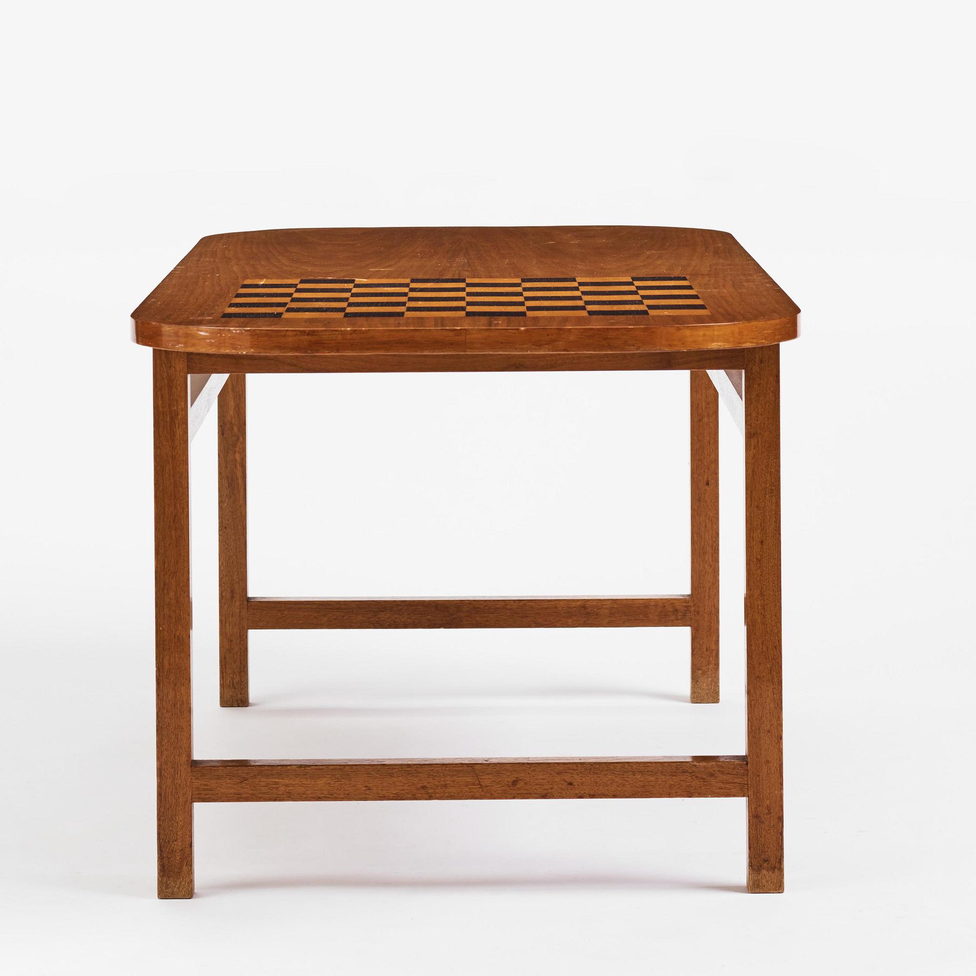 Josef Frank, a mahogany table with inlaid chessboard model "B 552", Firma Svenskt Tenn, 1940s-50s.