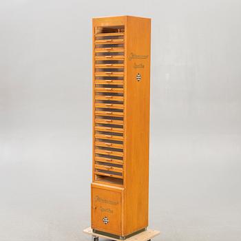 A display cabinet marked  "Gütermanns Sysilke", 1940s.