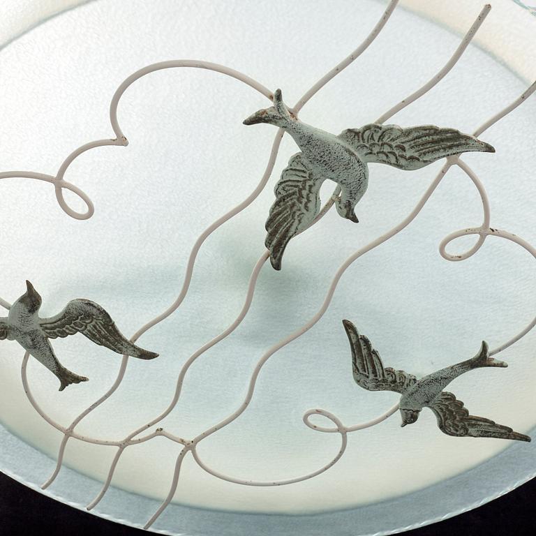 A 1930s art deco ceiling light.