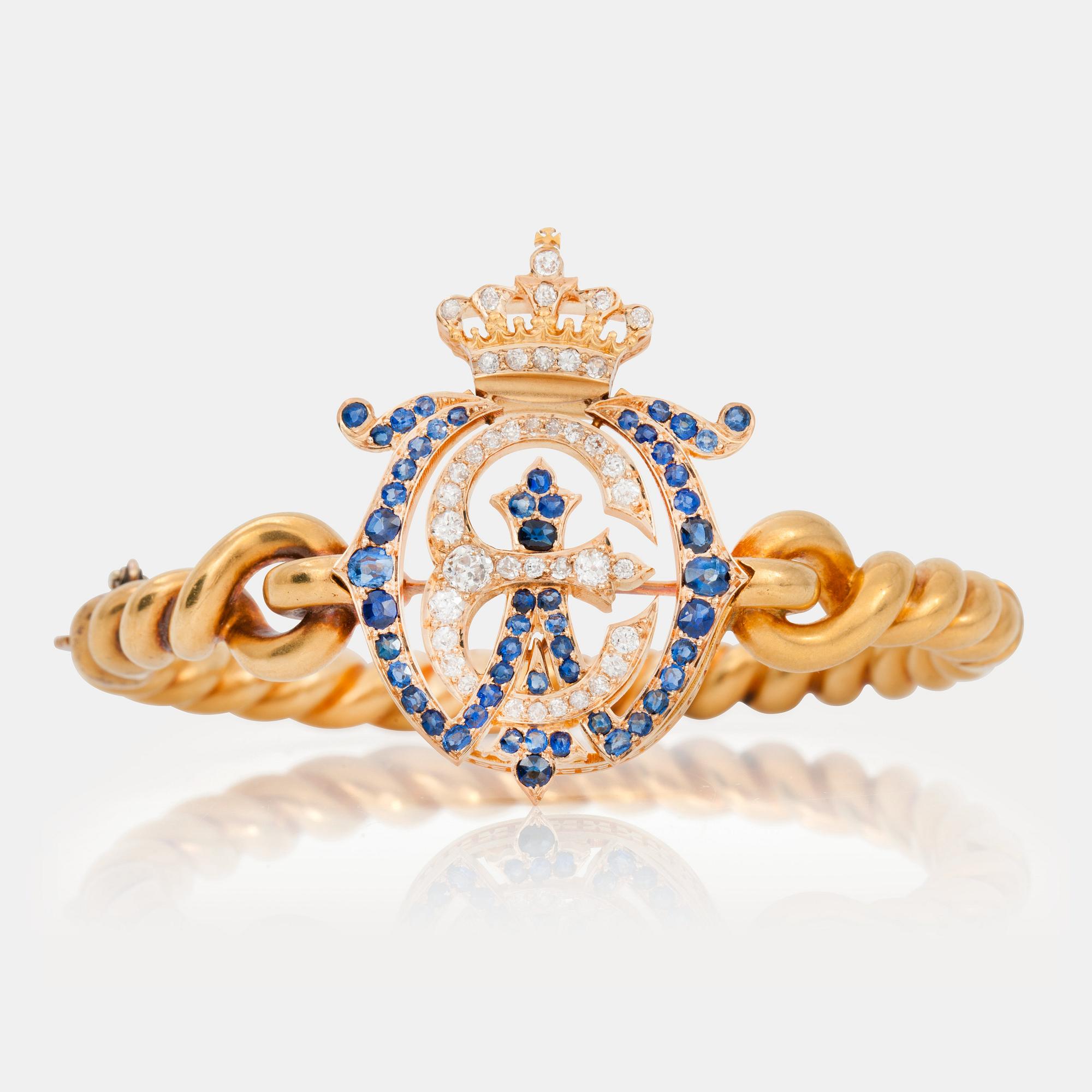 A Dutch late 19th century bracelet/brooch set with old-cut diamonds and sapphires.