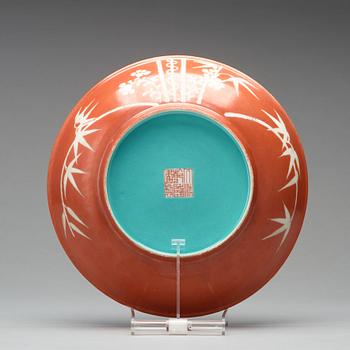A coral red ground bamboo dish, presumably Republic, early 20th Century.