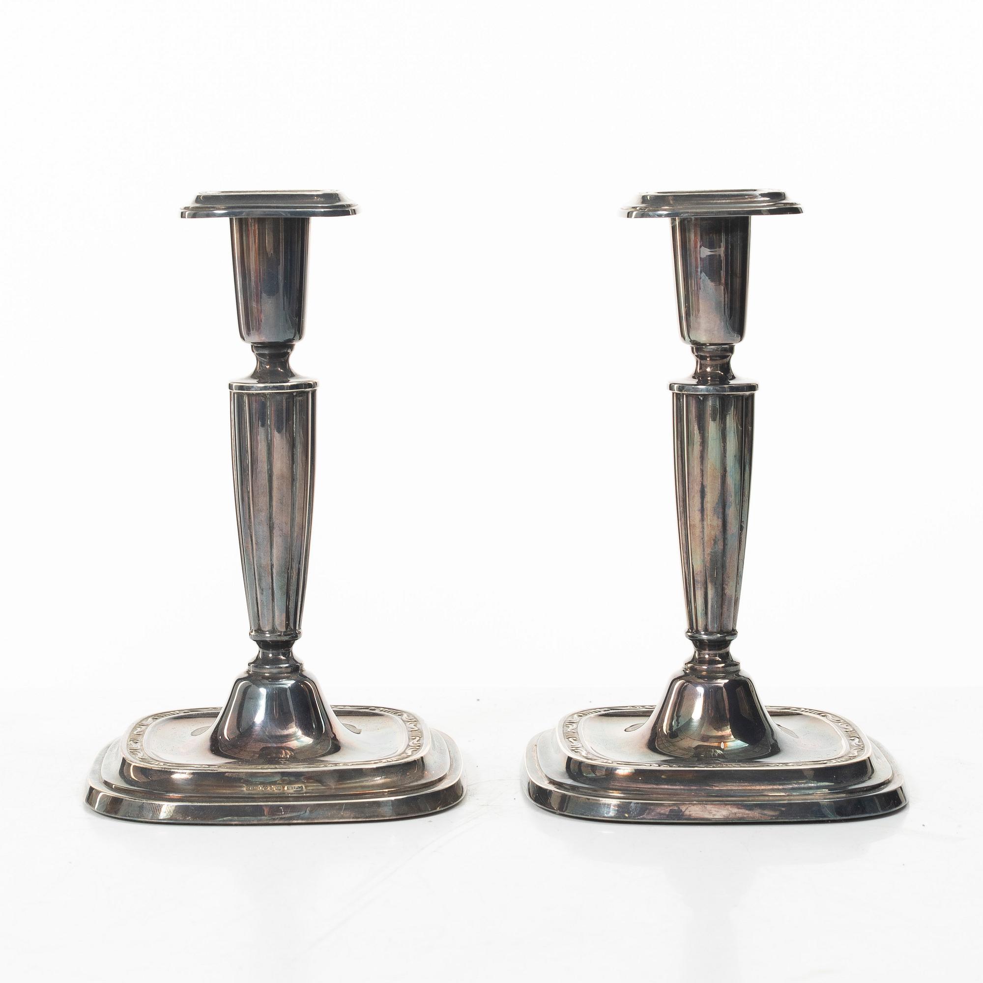 A pair of sterling silver candlesticks, C.G.Hallberg, Stockholm, Sweden, 1959.