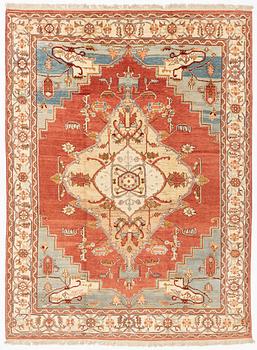A Heriz design carpet 393 x 293 cm.