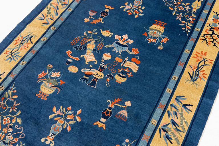 An antique, Beijing rug, north China, circa 1920. (243x163 cm).